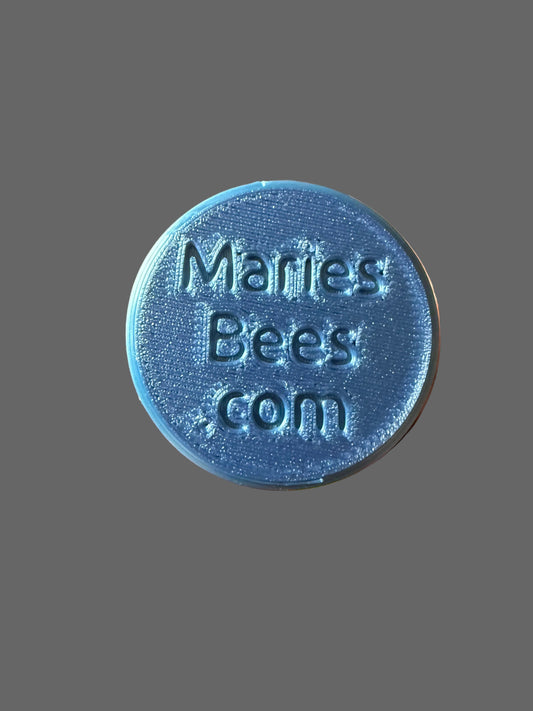 Bottom of the honeystick holder says mariesbees.com