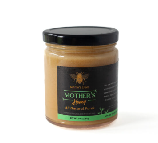 A glass jar filled with Mother's Honey our logo and the words All Natural Puree