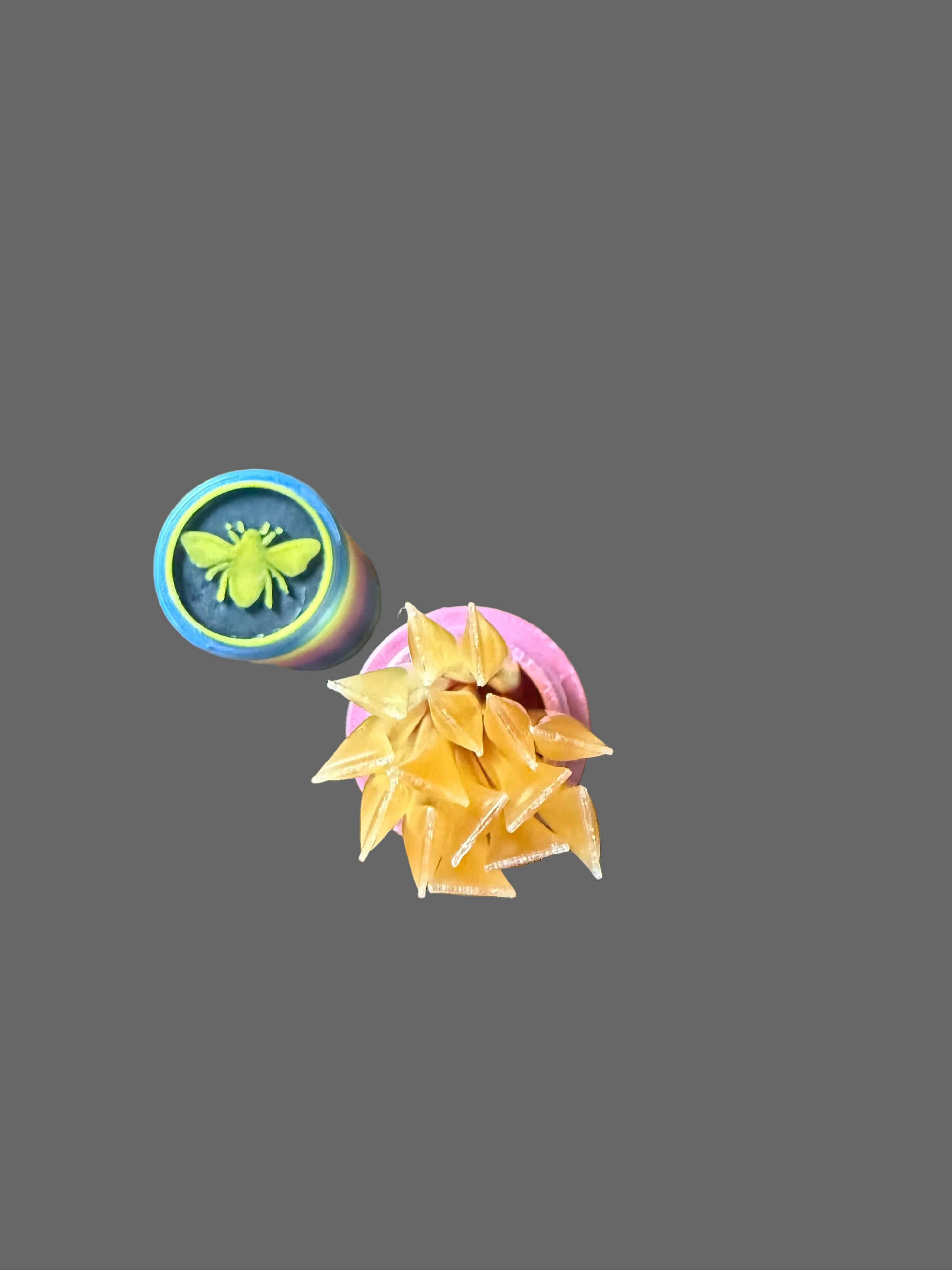 Sample of our Honey stick holder from above. Showing the top with our logo and the holder filled with honey sticks. Note honey sticks are sold separately. 