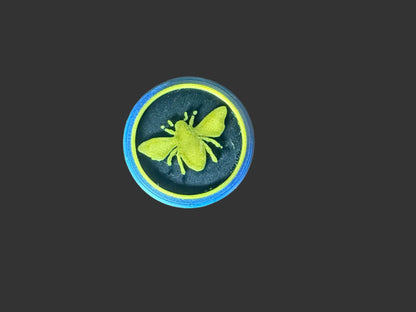 Top of our Honey stick holder. Our bee from our logo. 