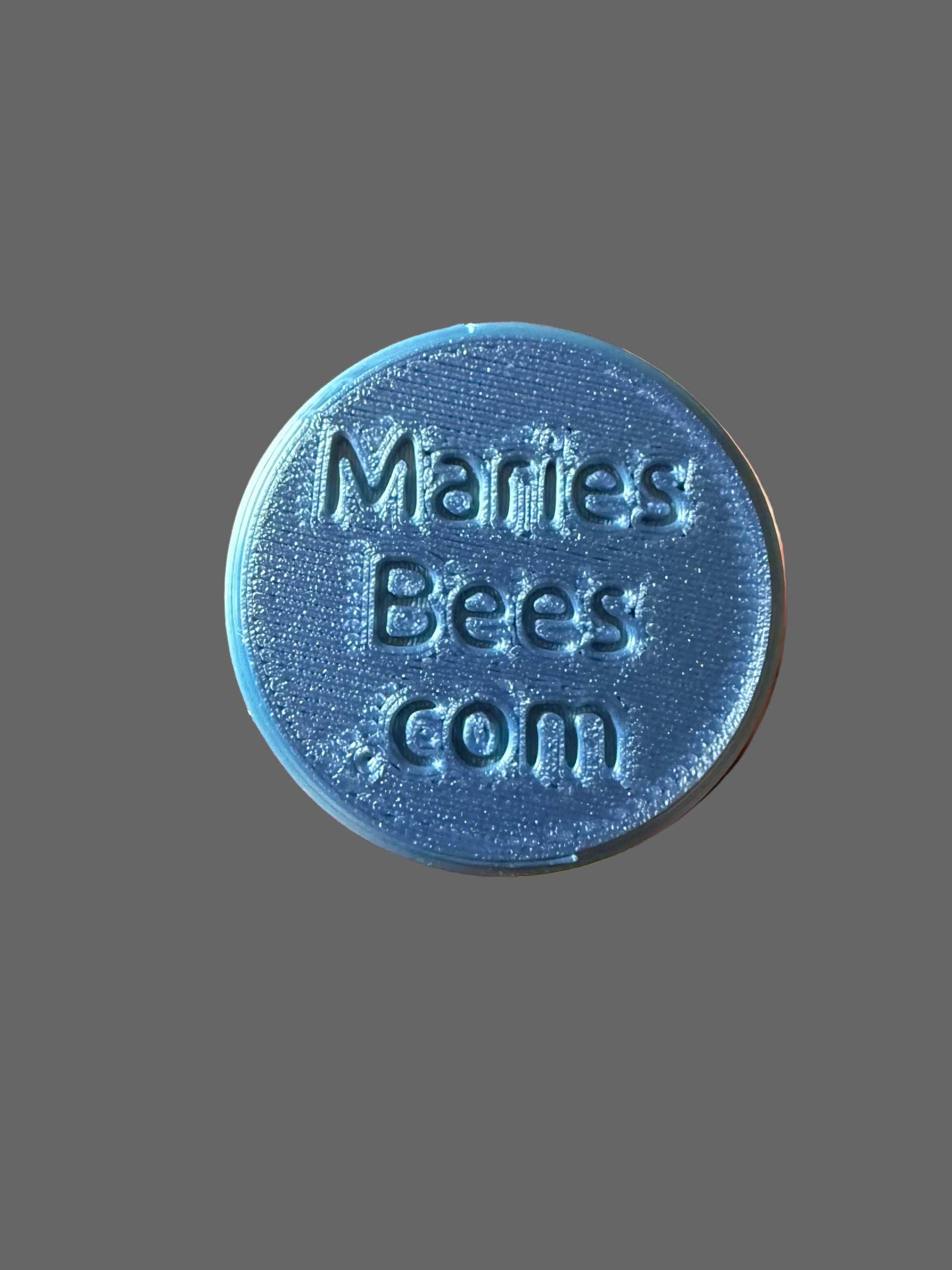 Bottom of the honeystick holder says mariesbees.com