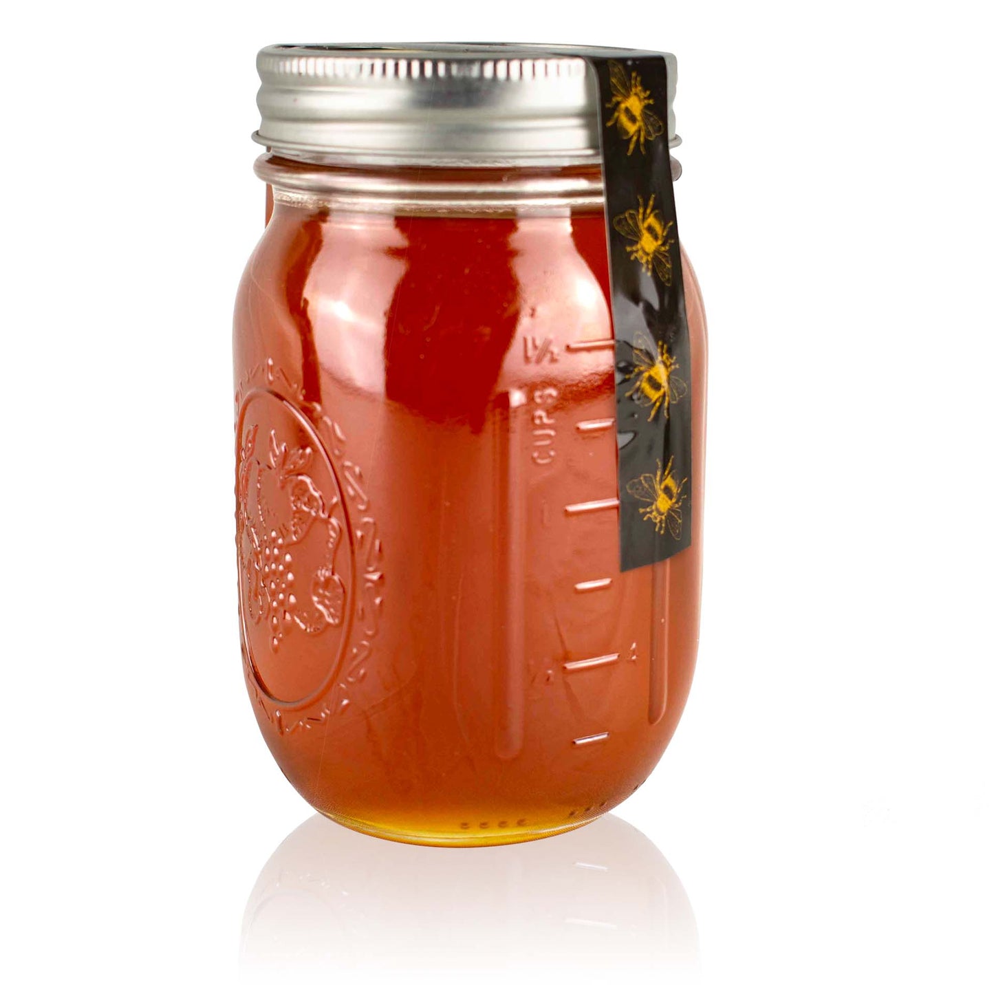 A 1lb (454g) pint jar of raw honey, with a label featuring a bee motif, set against a white background.